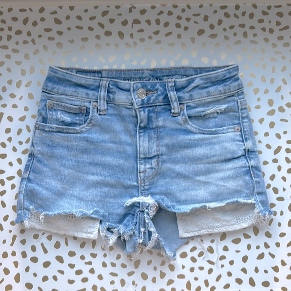 AMERICAN EAGLE LIGHT WASHED JEAN SHORTS FLORAL PATTERN POCKETS WOMENS 00